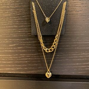 Guess Gold 3 piece layered heart necklace set